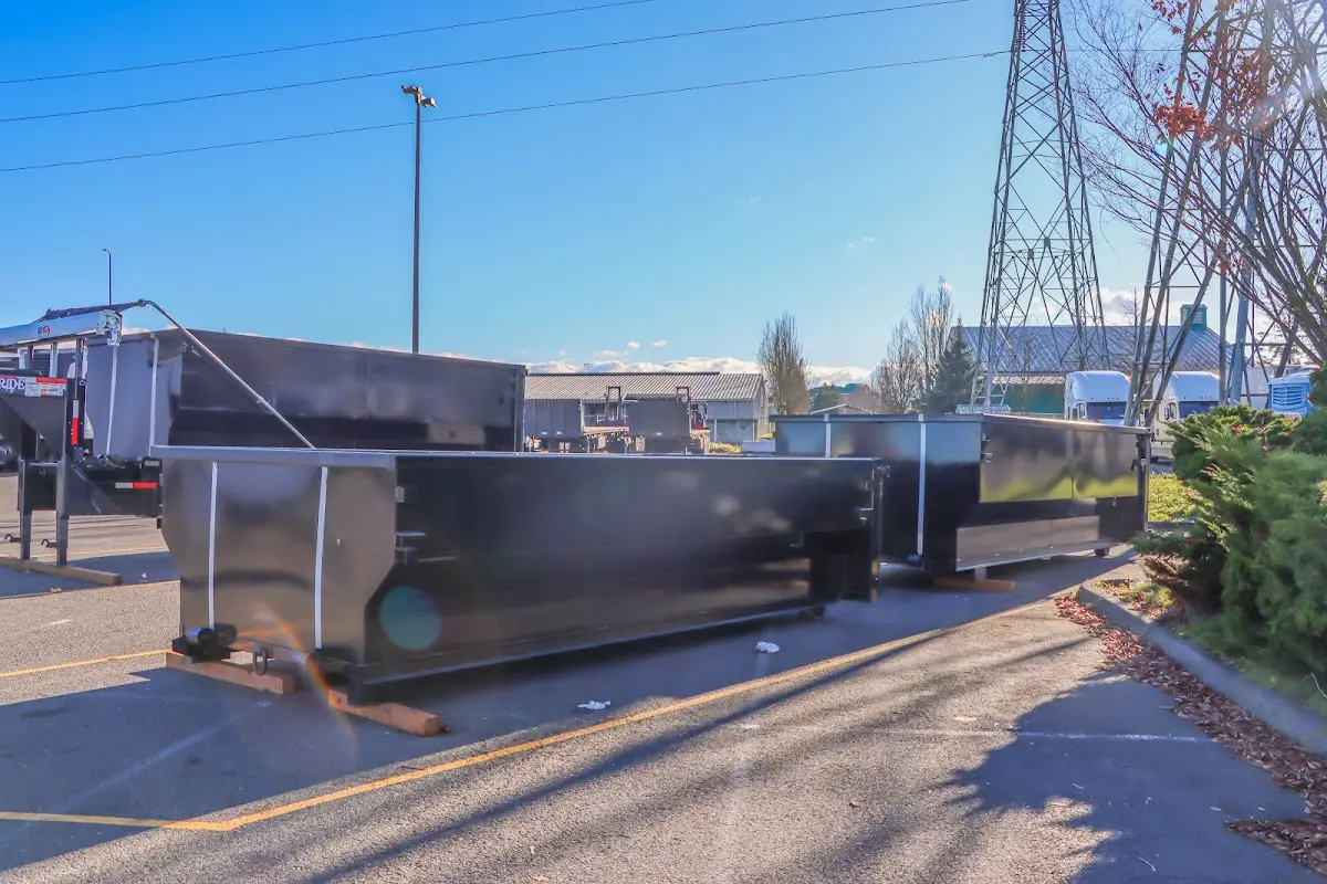Roll-off dumpster ready for waste disposal at job site for Construction Dumpster Rental in Palm Tree